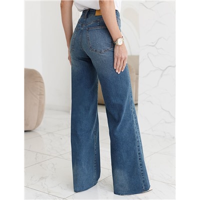 Джинсы клеш от колена из эластичного денима