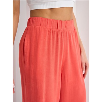 Брюки льняные кораллового цвета с карманами