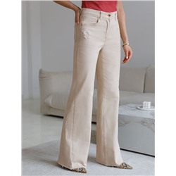 Джинсы клеш с прорезями и с необработанным краем из эластичного денима средней плотности