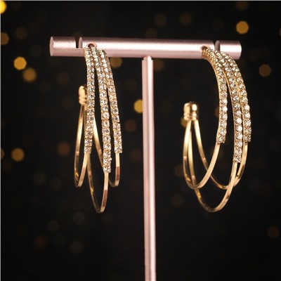 Серьги три кольца с сияющими кристаллами