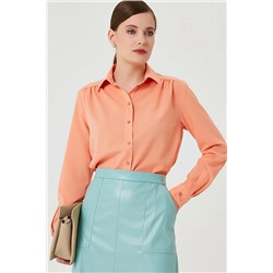 Оранжевая женская блузка