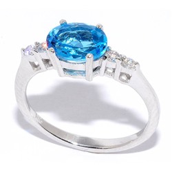 Серебряное кольцо с топазом "swiss blue"и куб.цирконием
