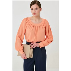 Оранжевая блуза из шифона с застроченными складками